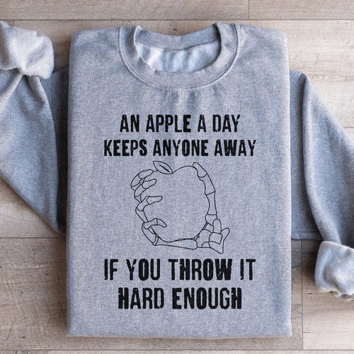 An Apple A Day Keeps Anyone Away If You Throw It Hard Enough Sweatshirt - WonderingCloth