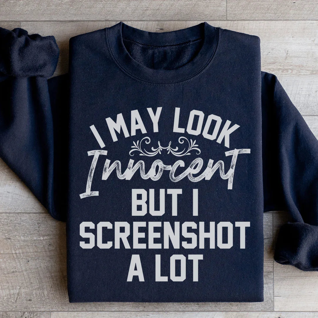 I May Look Innocent But I Screenshot A Lot Sweatshirt - WonderingCloth
