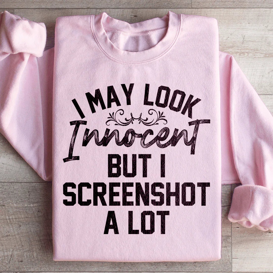 I May Look Innocent But I Screenshot A Lot Sweatshirt - WonderingCloth