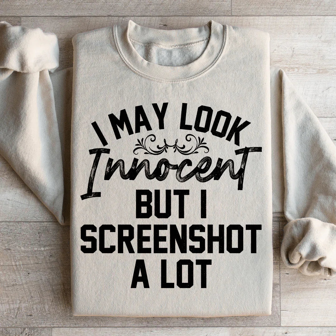 I May Look Innocent But I Screenshot A Lot Sweatshirt - WonderingCloth