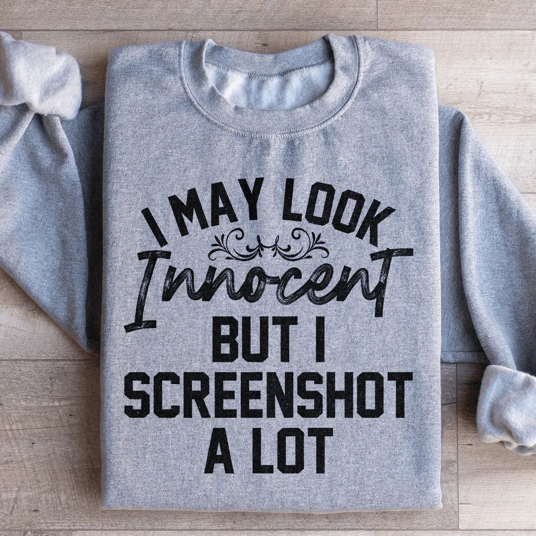 I May Look Innocent But I Screenshot A Lot Sweatshirt - WonderingCloth