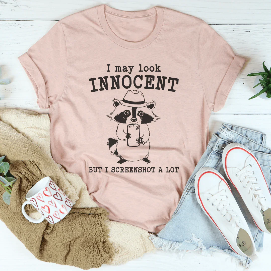 I May Look Innocent But I Screenshot A Lot Tee - WonderingCloth